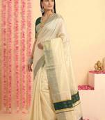 Dark green chathura zari tussel tissue kerala sarees
