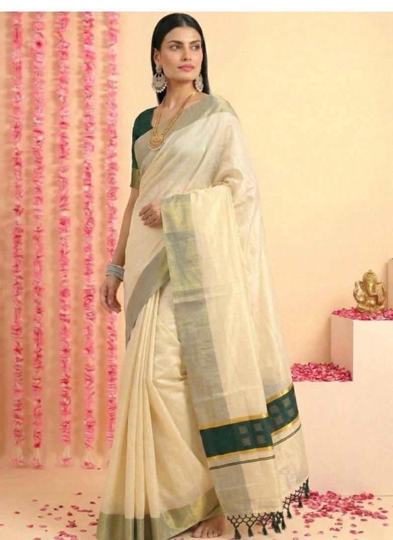 Dark green chathura zari tussel tissue kerala sarees