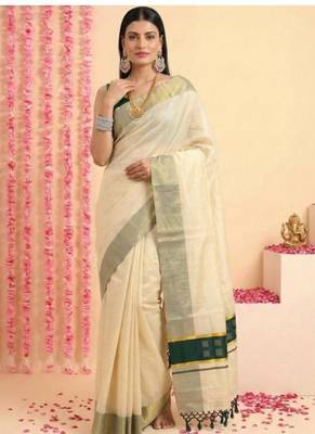 dark green tissue chathura kerala saree with zari work 2