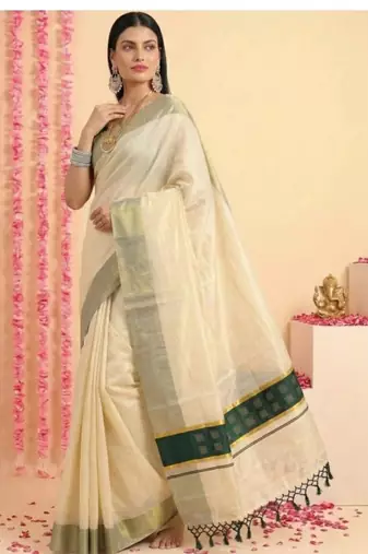 Dark green chathura zari tussel tissue kerala sarees