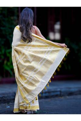off white zari tissue kasavu saree with golden tassels 4