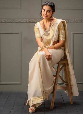 off white zari border tissue kasavu saree 1