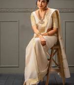 Woven design zari kasavu saree