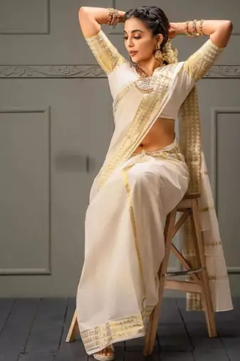 Woven design zari kasavu saree