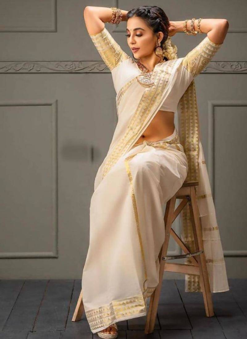 Woven design zari kasavu saree
