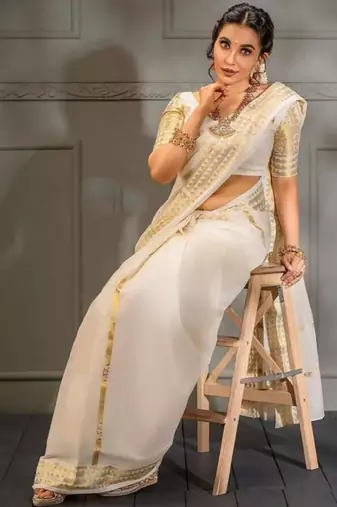 Woven design zari kasavu saree