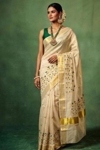 white floral embroidered tissue handloom kasavu saree