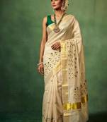 Floral embroidered tissue handloom kasavu saree
