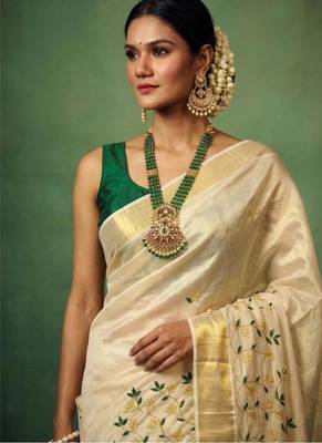 white floral embroidered tissue handloom kasavu saree 2