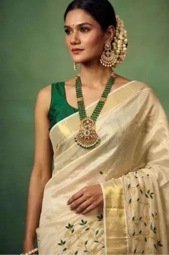 Floral embroidered tissue handloom kasavu saree