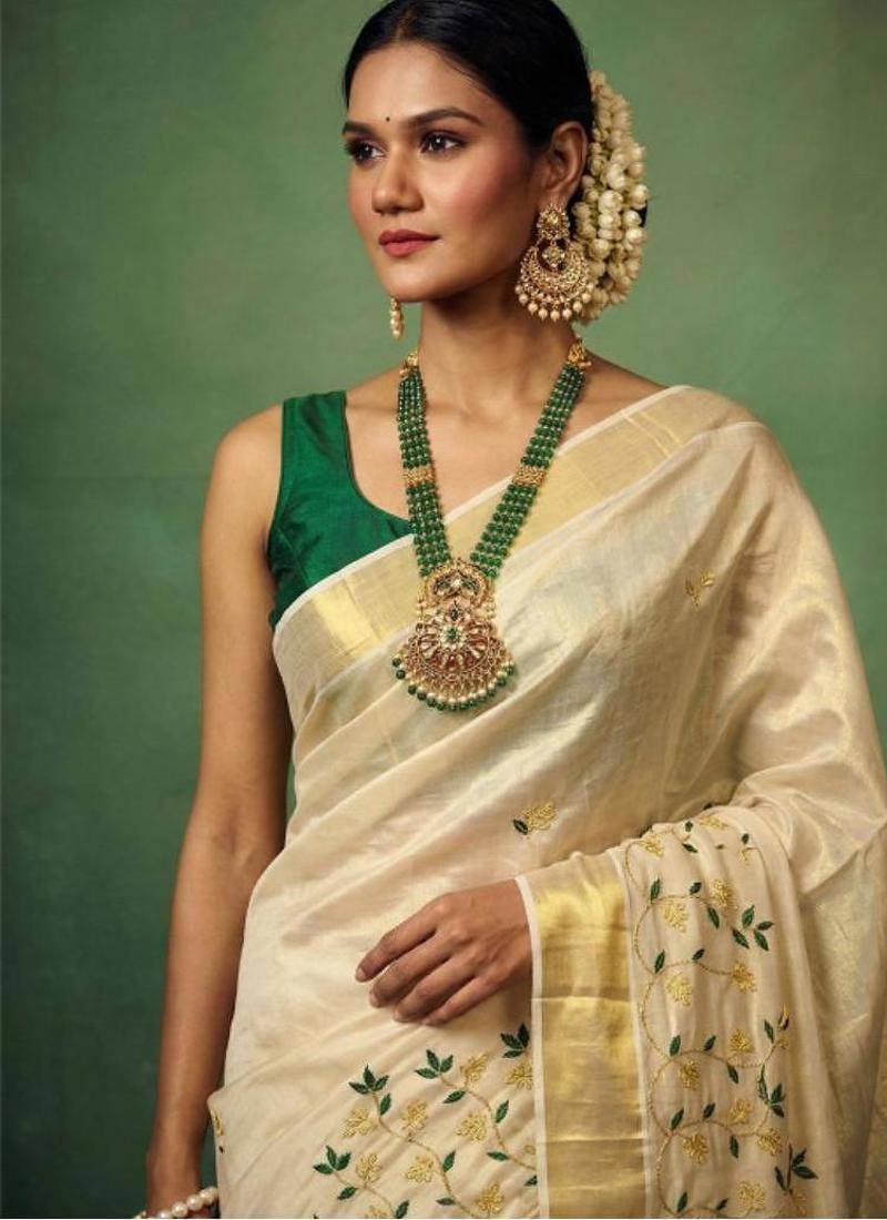 Floral embroidered tissue handloom kasavu saree