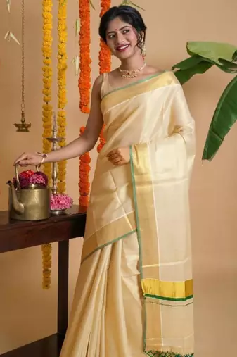 Zari woven design tissue kasavu saree