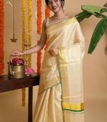 Zari woven design tissue kasavu saree