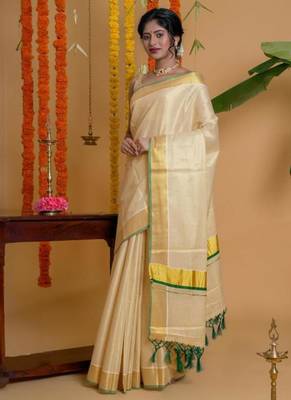 off white zari woven design tissue kasavu saree with green detailing 3