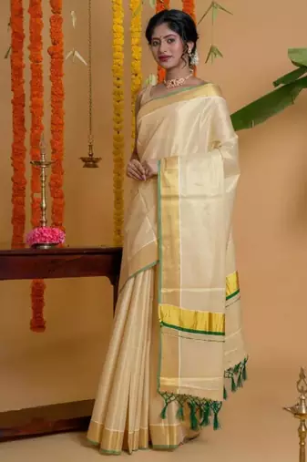Zari woven design tissue kasavu saree