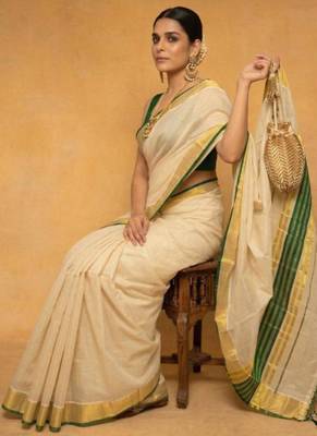 cream zari tissue kasavu saree with green temple border 3