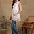 Women white pure cotton floral embroidered hip length collared neck sleeveless lucknowi chikankari short kurta