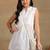 Women white pure cotton floral embroidered hip length collared neck sleeveless lucknowi chikankari short kurta