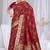 Dusty mauve raw silk saree with zari and floral thread work with tassels