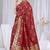 Dusty mauve raw silk saree with zari and floral thread work with tassels