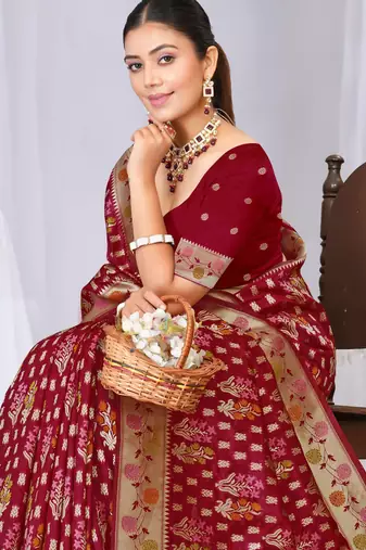 Dusty mauve raw silk saree with zari and floral thread work with tassels