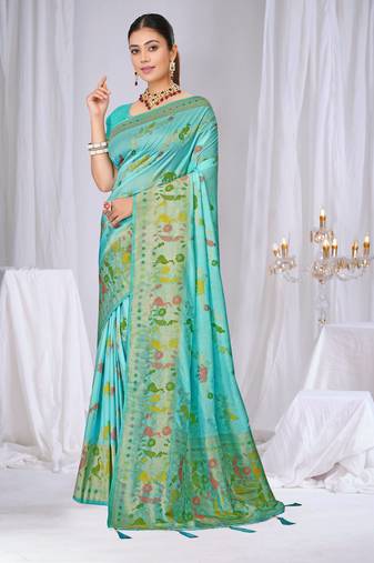 Sky blue faux georgette saree with zari and thread work with tassels