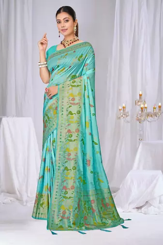 Sky blue faux georgette saree with zari and thread work with tassels