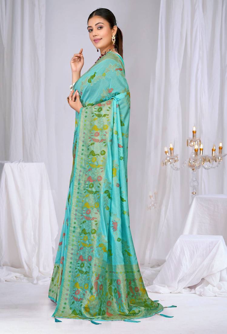 Sky blue faux georgette saree with zari and thread work with tassels
