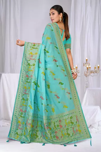 Sky blue faux georgette saree with zari and thread work with tassels