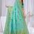 Sky blue faux georgette saree with zari and thread work with tassels