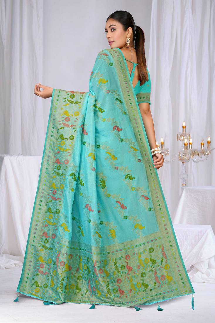 Sky blue faux georgette saree with zari and thread work with tassels