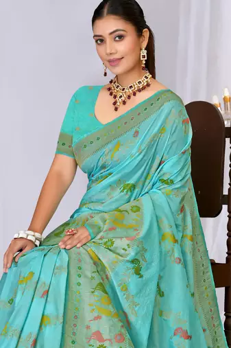 Sky blue faux georgette saree with zari and thread work with tassels