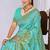Sky blue faux georgette saree with zari and thread work with tassels
