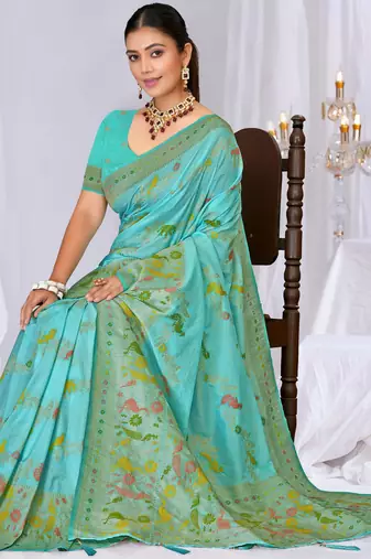 Sky blue faux georgette saree with zari and thread work with tassels