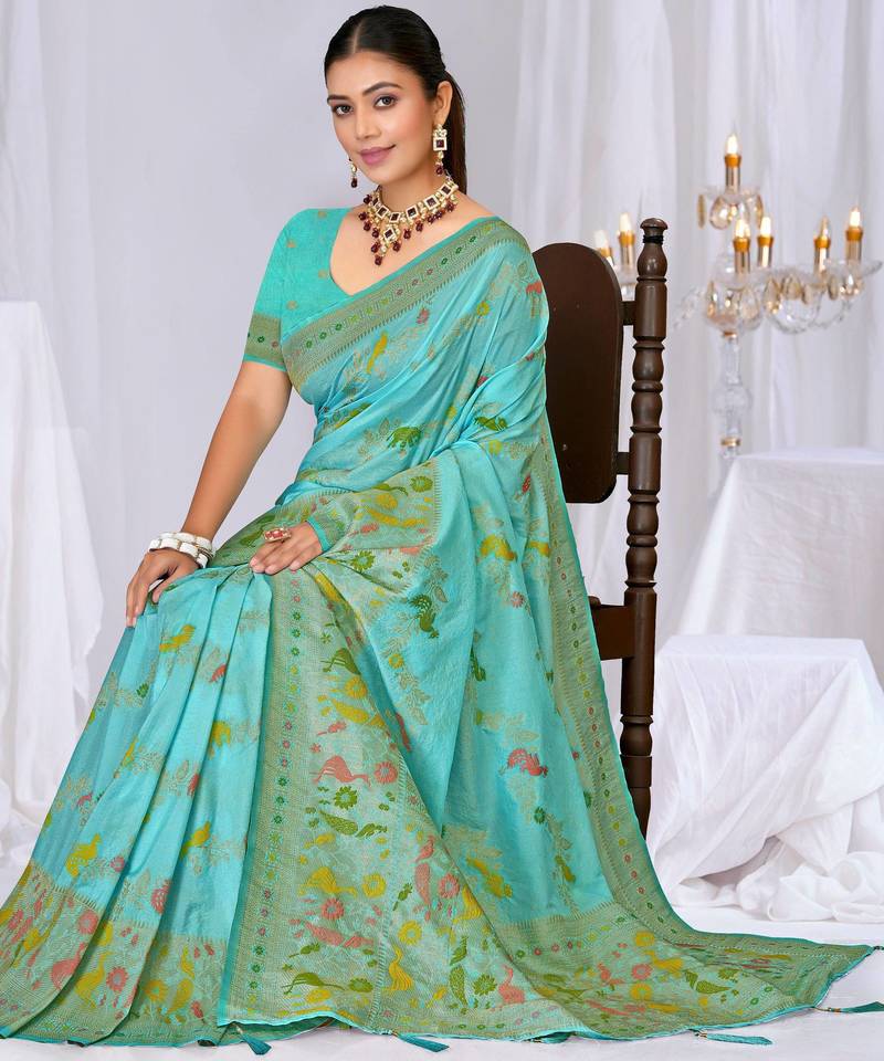 Sky blue faux georgette saree with zari and thread work with tassels