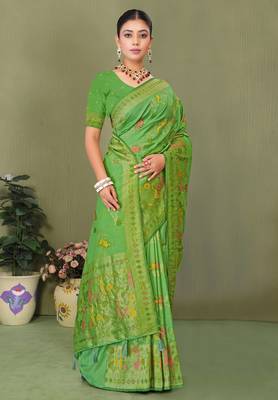 Light green faux georgette saree with zari and thread work with tassels 1