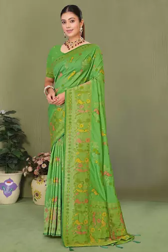 Light green faux georgette saree with zari and thread work with tassels