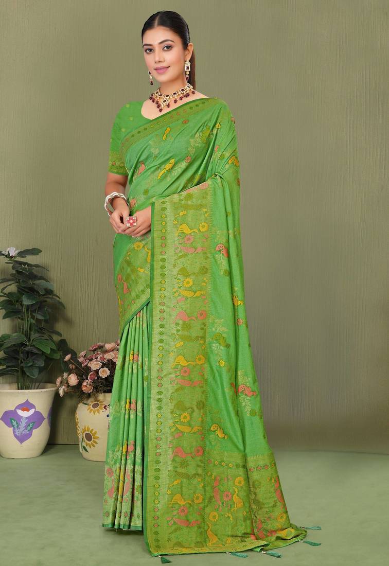 Light green faux georgette saree with zari and thread work with tassels