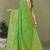 Light green faux georgette saree with zari and thread work with tassels