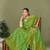 Light green faux georgette saree with zari and thread work with tassels