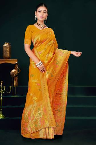 Mustard yellow faux georgette saree with zari and thread work with tassels