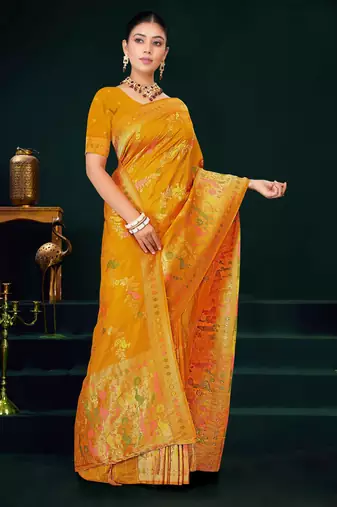 Mustard yellow faux georgette saree with zari and thread work with tassels