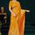 Mustard yellow faux georgette saree with zari and thread work with tassels