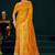 Mustard yellow faux georgette saree with zari and thread work with tassels