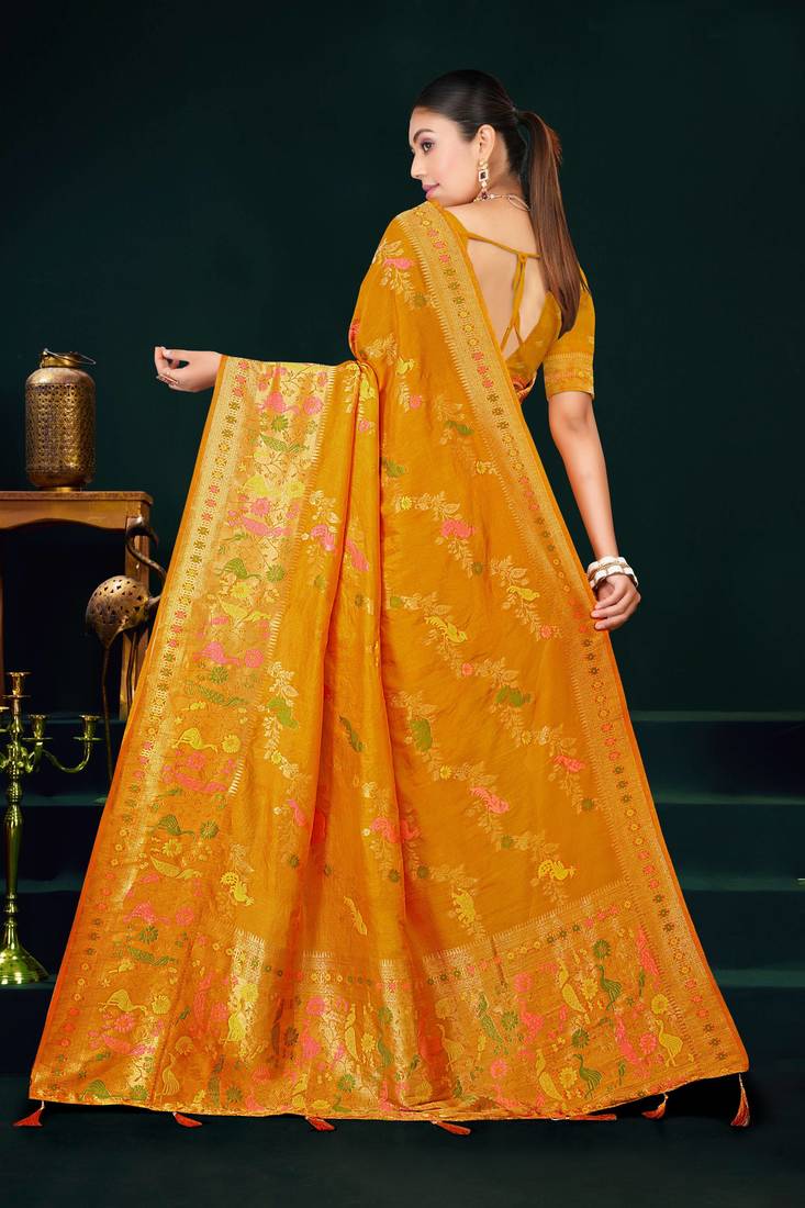 Mustard yellow faux georgette saree with zari and thread work with tassels