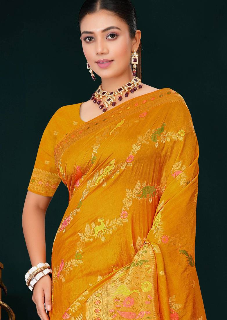 Mustard yellow faux georgette saree with zari and thread work with tassels