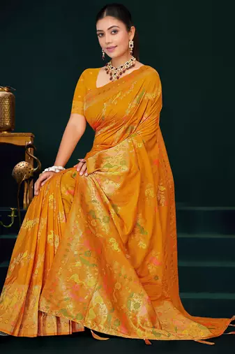 Mustard yellow faux georgette saree with zari and thread work with tassels