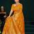 Mustard yellow faux georgette saree with zari and thread work with tassels