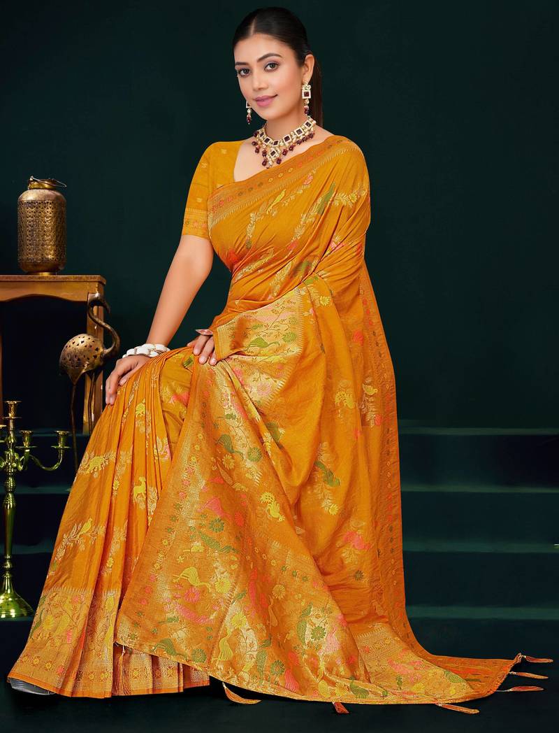 Mustard yellow faux georgette saree with zari and thread work with tassels