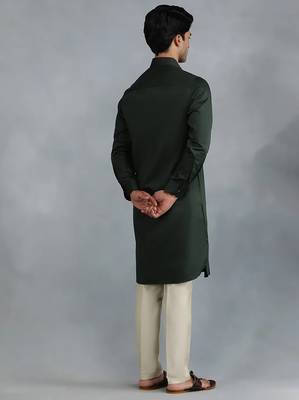 Classic style dark green pathani kurta with cream pants 3